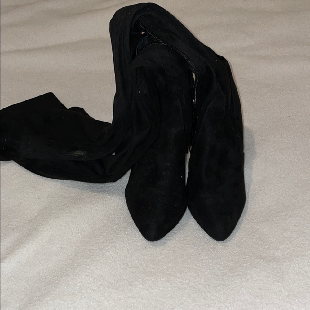 Thigh high black boots